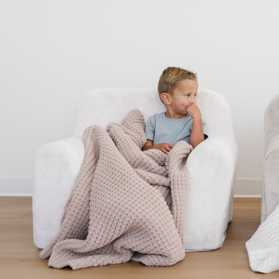 The Saranoni Waffle Knit Toddler Blanket in Wheat gives elevated comfort, making it a standout best baby blanket.