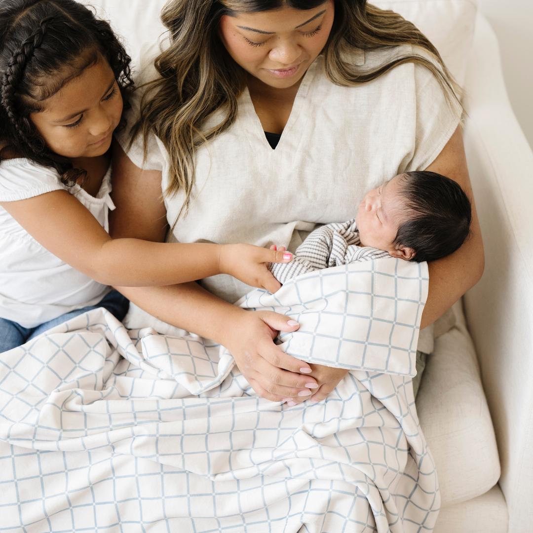 Saranoni Minky Stretch Receiving Blanket in Grid offers delicate texture and warmth, ideal for baby girl blankets.