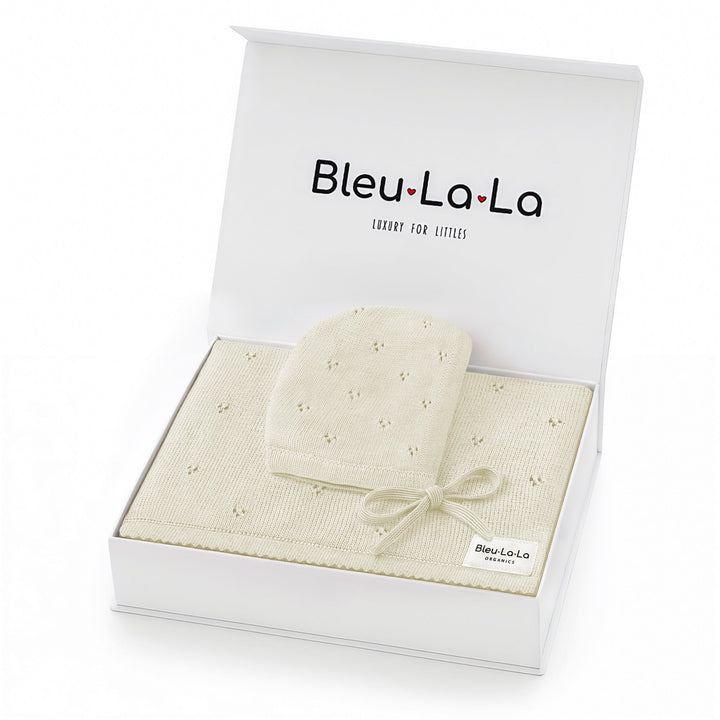 Bleu La La Organic Pointelle Swaddle Blanket + Hat Gift Set in butter cream, gift box presentation showing lightweight organic cotton.