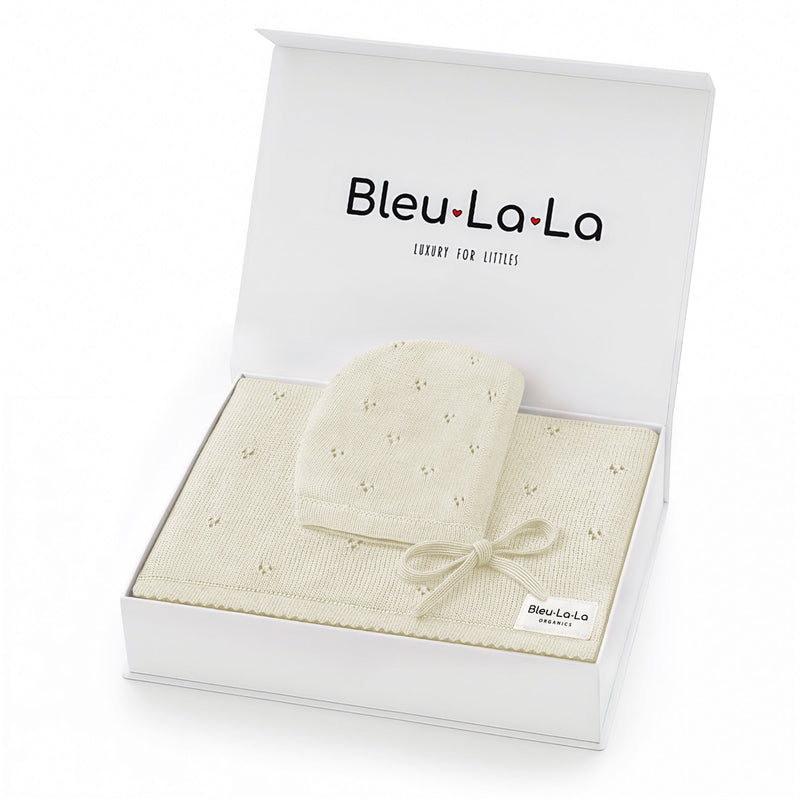 Bleu La La Organic Pointelle Swaddle Blanket + Hat Gift Set in butter cream, gift box presentation showing lightweight organic cotton.