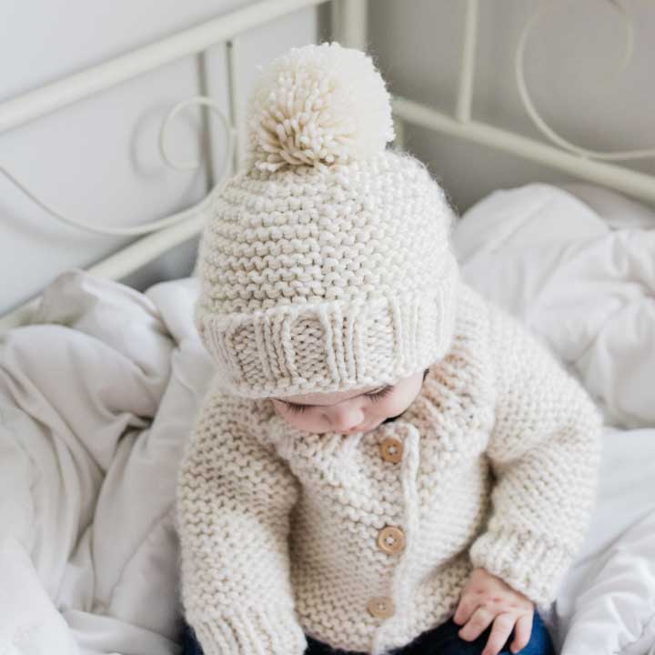 Classic Huggalugs Natural Garter Stitch Beanie Baby & Kids, a soft and snug baby beanie hat for chilly days.