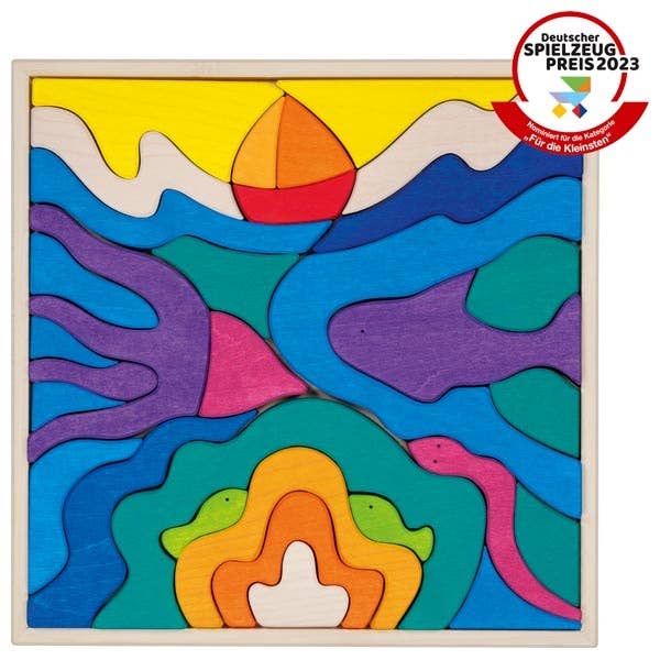 Create towers and shapes with the Goki Ocean Building Set, a wooden toy in calming ocean tones.