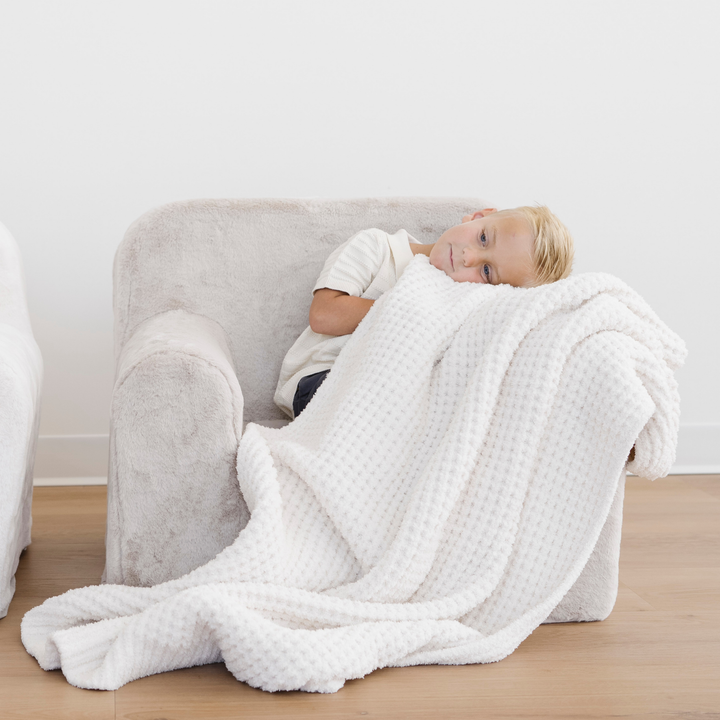 Swan Saranoni Waffle Knit Toddler Blanket keeps little ones snug, making it a go-to best toddler blanket.
