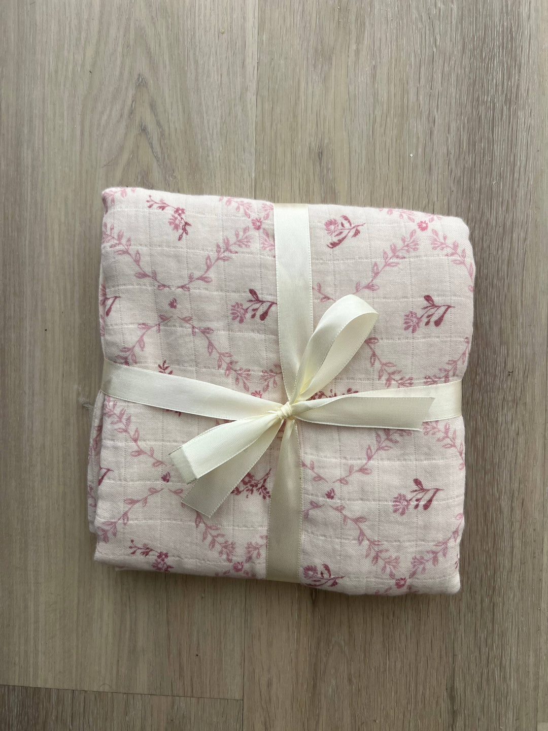 Little Threads muslin blanket wrapped and tied with ribbon for a gift ready presentation