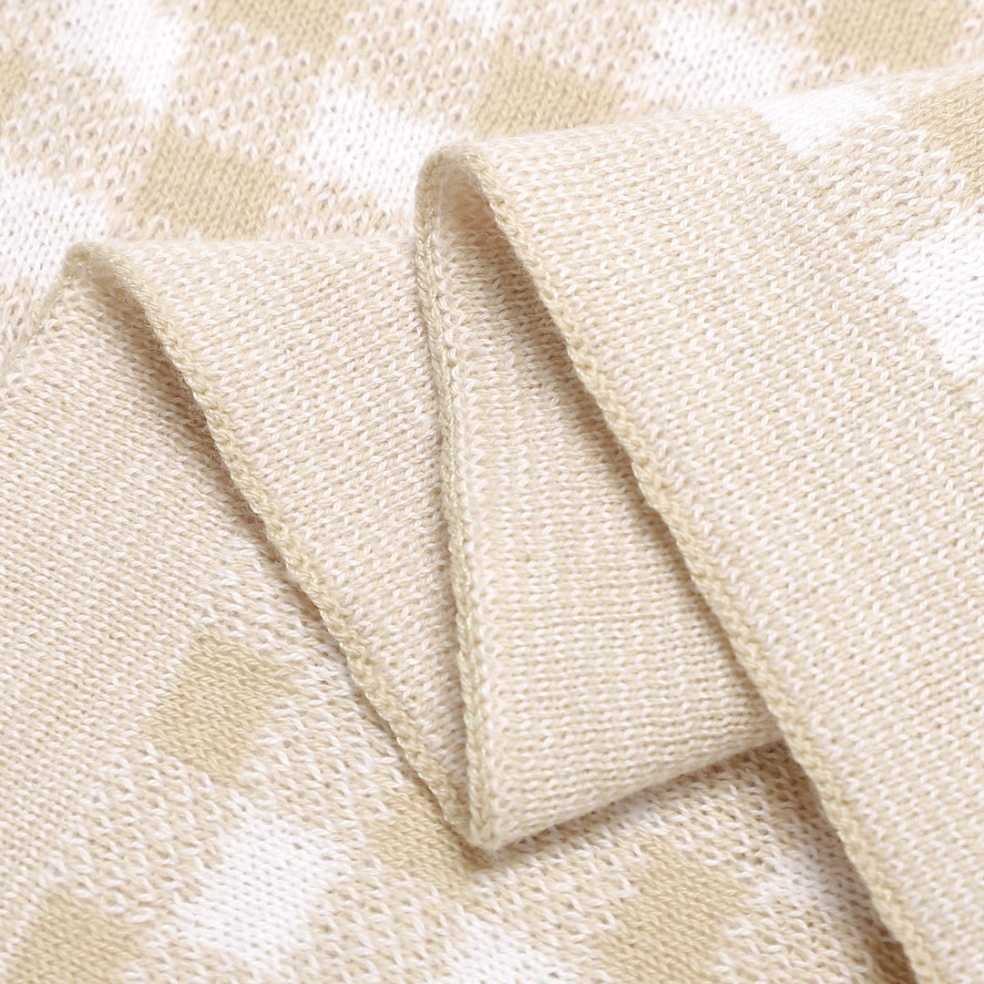 Pink Bleu La La checkered knit baby blanket folded flat, modern cotton blanket for nursery styling