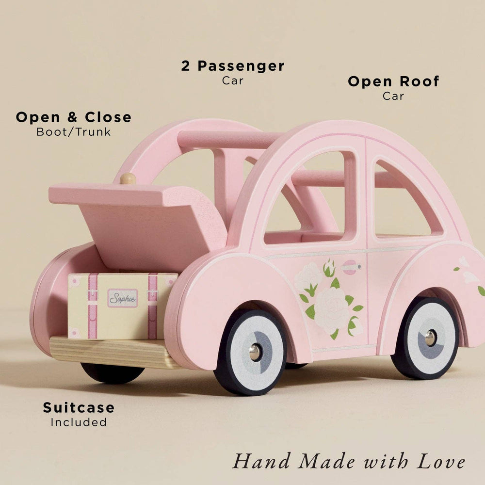 Le Toy Van Sophie's Dolls House Toy Car features, two passenger open roof design, opening trunk and suitcase included