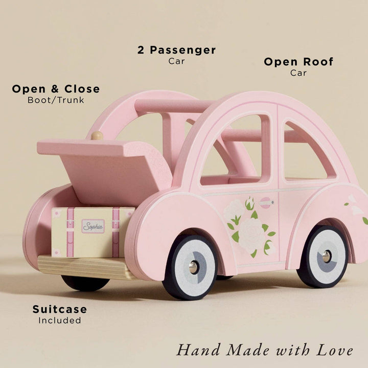 Le Toy Van Sophie's Dolls House Toy Car features, two passenger open roof design, opening trunk and suitcase included