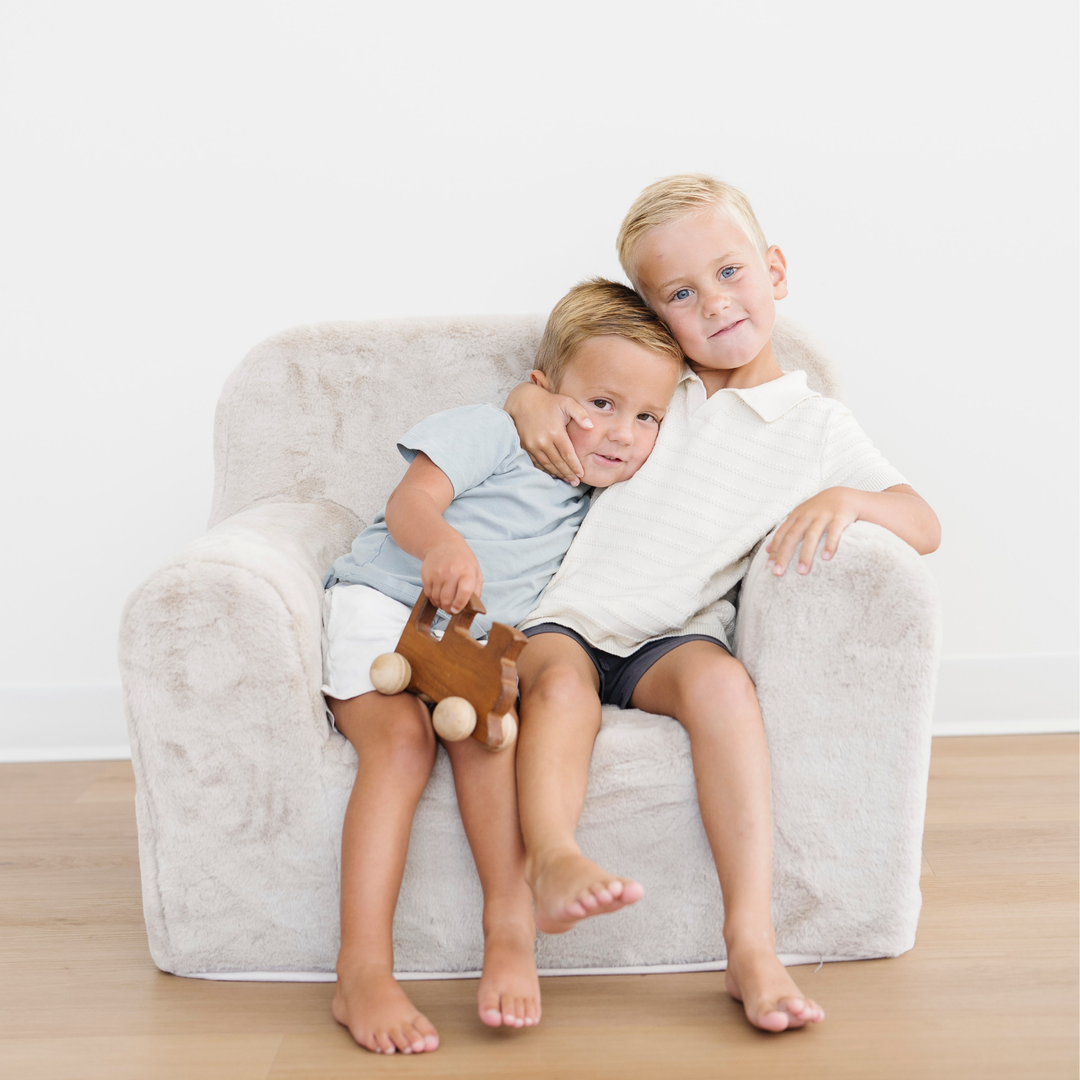 Perfect for naps or play, the Cream Saranoni Snuggle Up Chair provides a comfy lounge chair for kids.