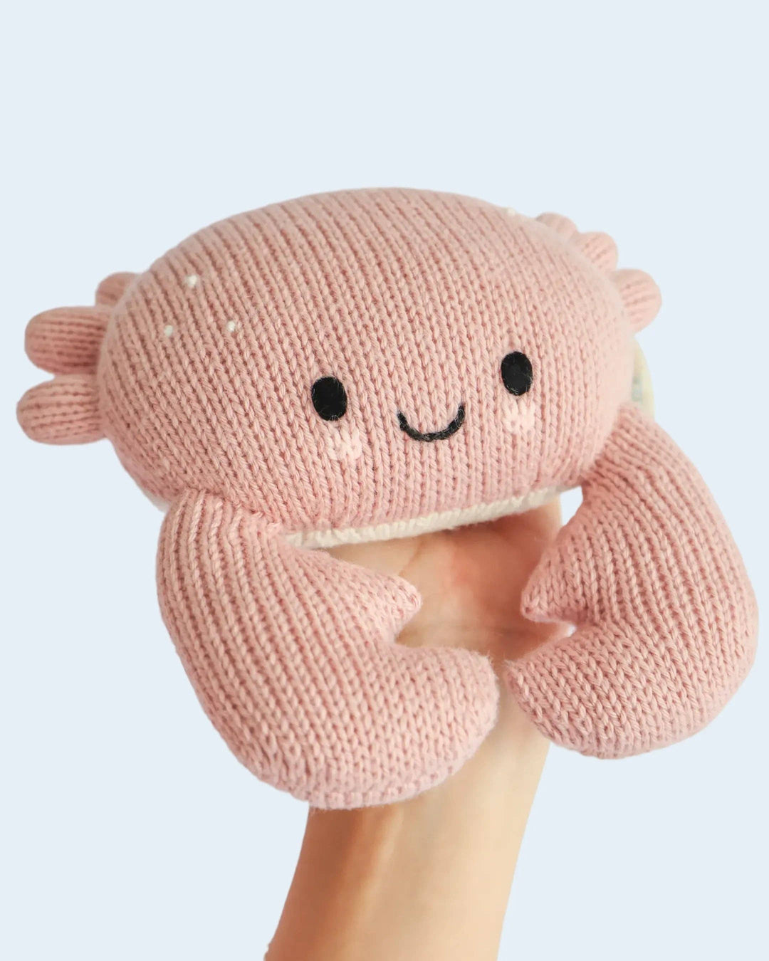 Hand-knit crab stuffed animal: Cuddle + Kind Baby Crab in Blush, a soft heirloom baby gift