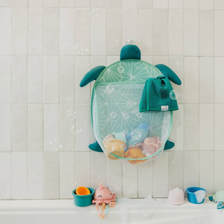 Copper Pearl bath toy organizer mounted on wall, mesh caddy for storing bath toys and keeping bathroom tidy