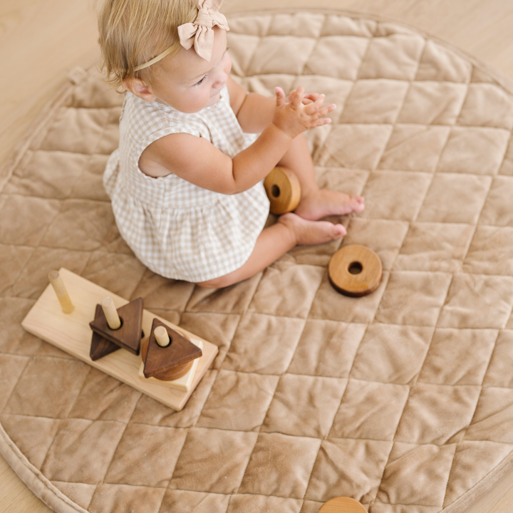 Made for cozy floor moments, Saranoni Minky Play Mat in Hazelnut delivers comfort as a Kids play mat.