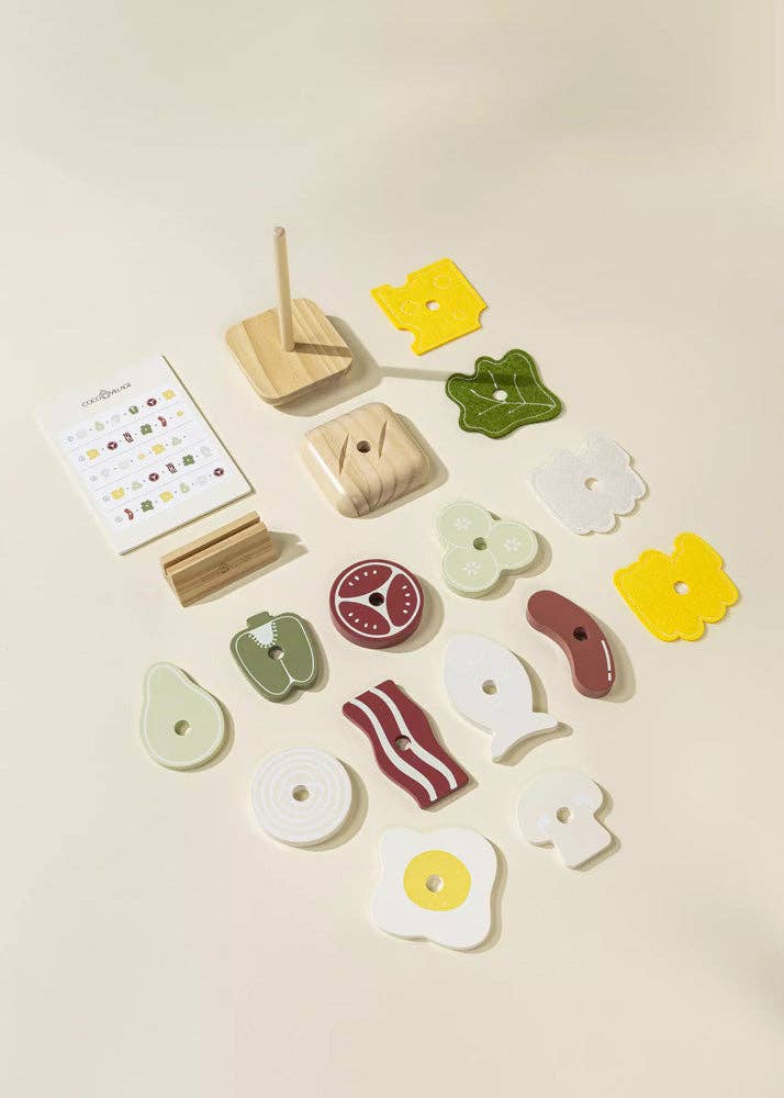 assortment of wood and cloth pretend play sandwich toppings and menu coco village sand which toy