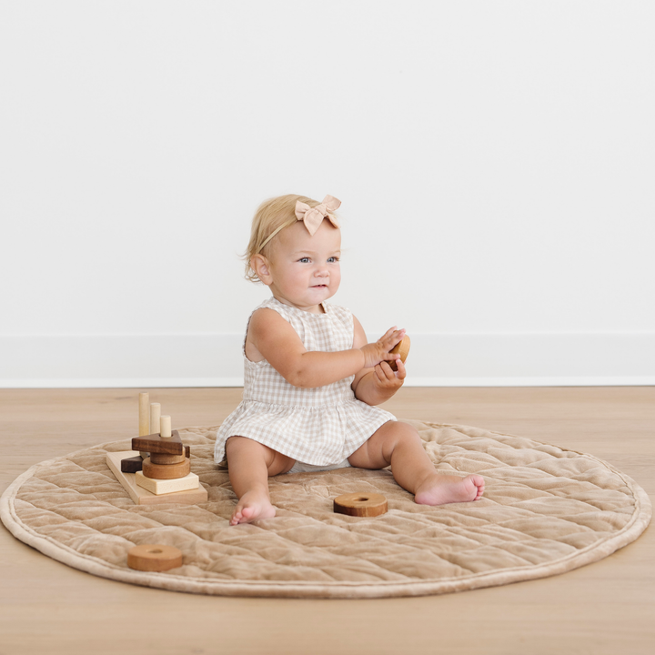 Softness you can see Ñ the Saranoni Minky Play Mat in Hazelnut works beautifully as a premium Play mat.