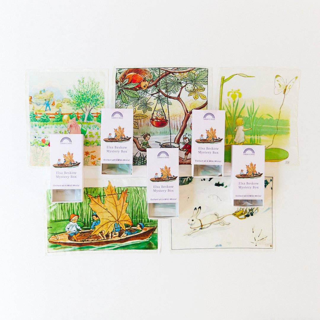 Scattered storybook prints preview the artwork found in every Elsa Beskow Mini Mystery Playsilk
