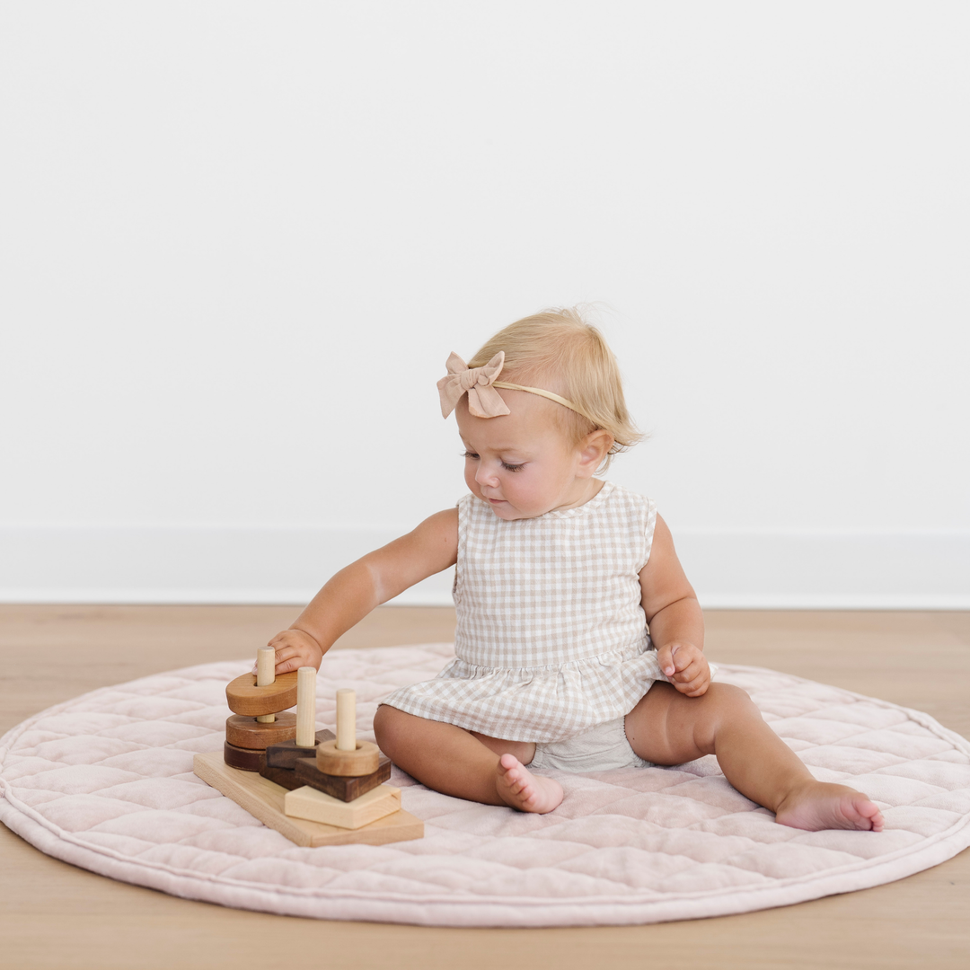 Featuring thick minky comfort, the Saranoni Minky Play Mat in Cameo makes an amazing Toddler play mat.