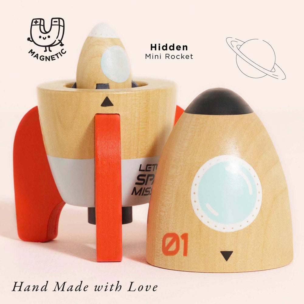 Le Toy Van Magnetic Space Rocket Duo opened to reveal the hidden mini rocket inside, hand made wooden space toy