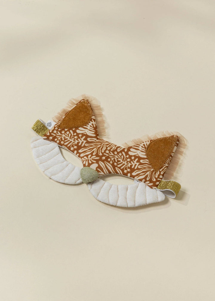 The Coco Village Fantastic Fox Mask is a whimsical dress-up accessory that encourages open-ended, screen-free imaginative play.
