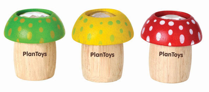 PlanToys mushroom kaleidoscope collection showing red green and yellow wooden toys