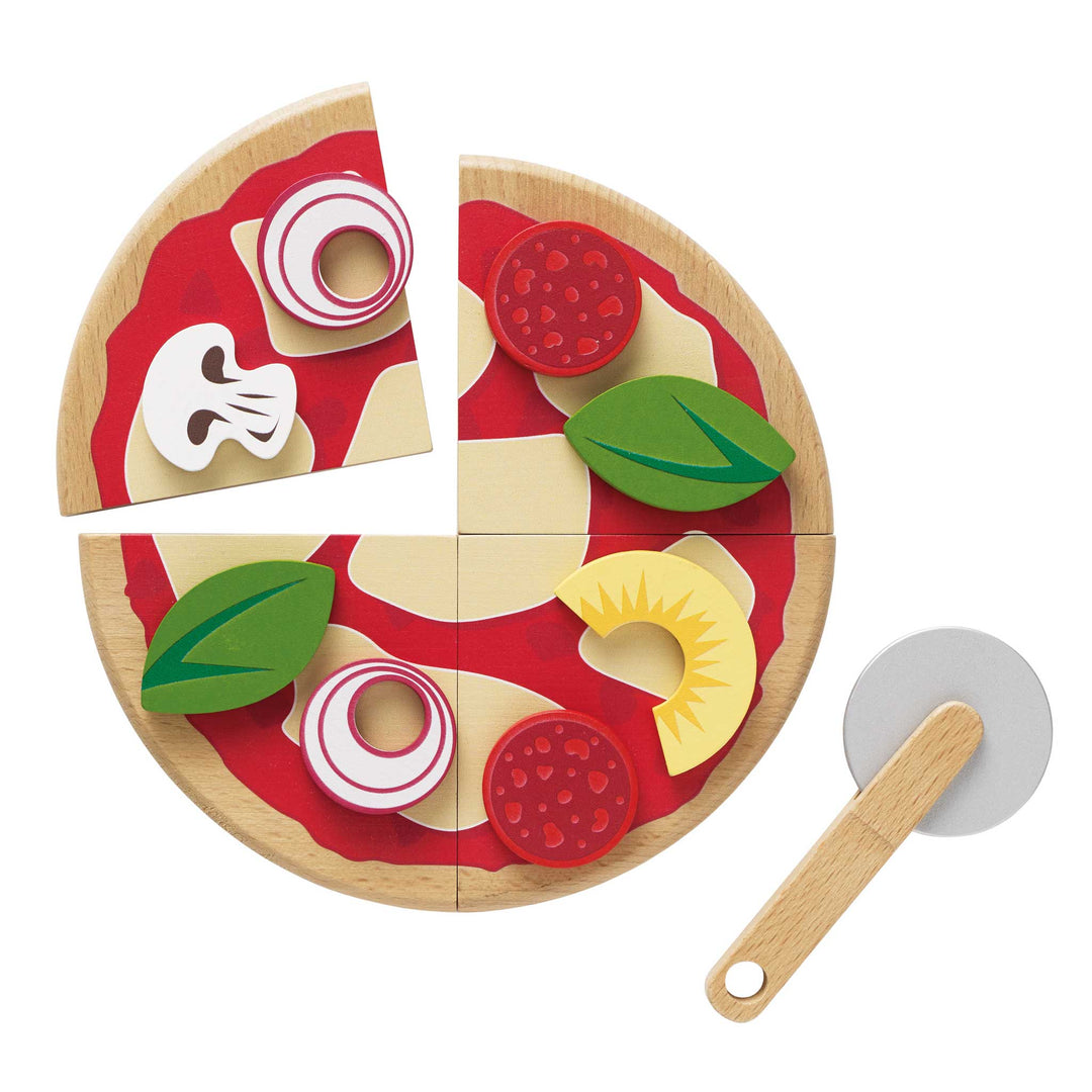 A wooden pizza sliced into quarters with mushroom, onion, pepperoni, and basil toppings from Le Toy Van