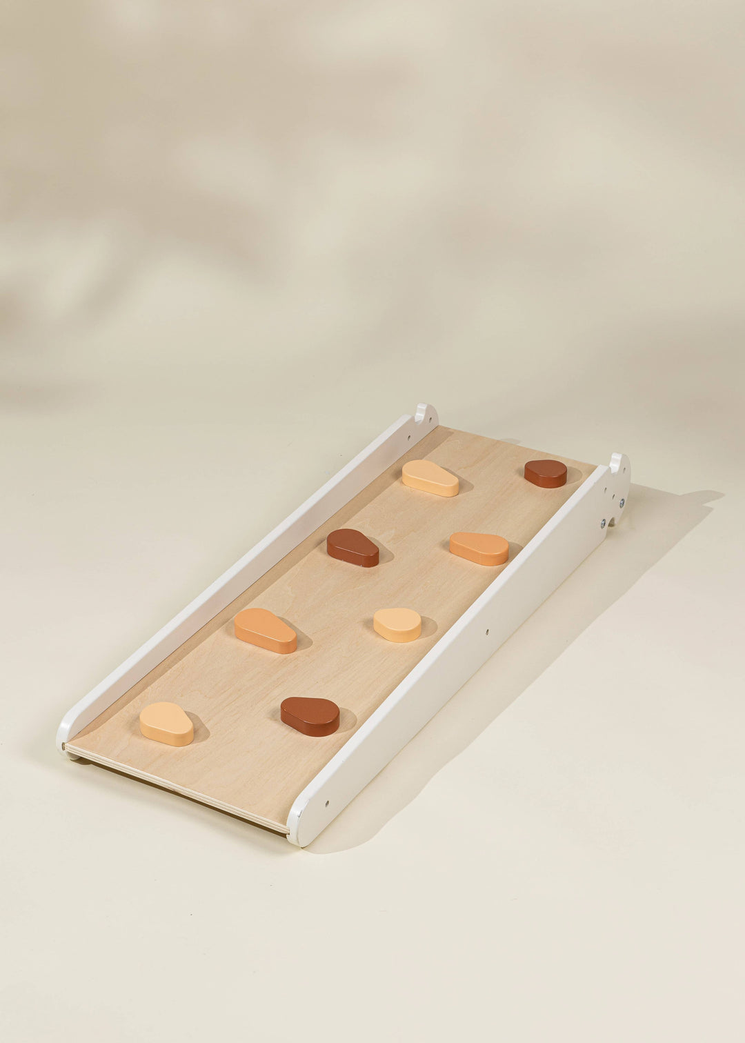 Crafted for balance, the Coco Village Montessori 2-in-1 Grip Climber Board & Slide in Natural wood makes an ideal toddler toys essential.