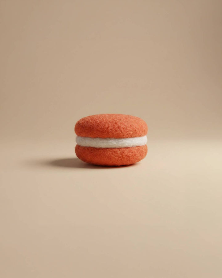 Close-up of Kaddu's Felt Macaron showing soft wool bakery detail