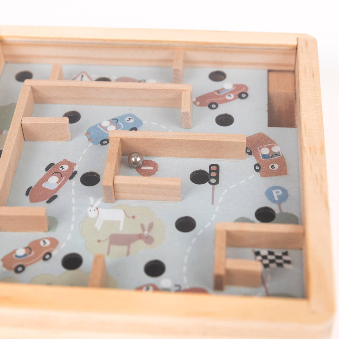 Top down view of the car and road pattern inside Egmont's Mini Wooden Labyrinth