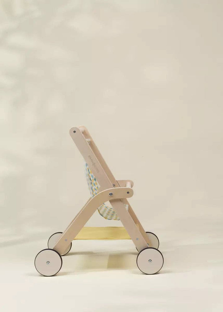 Back angle of Coco Village's wooden toy stroller showing sturdy frame construction for toddlers