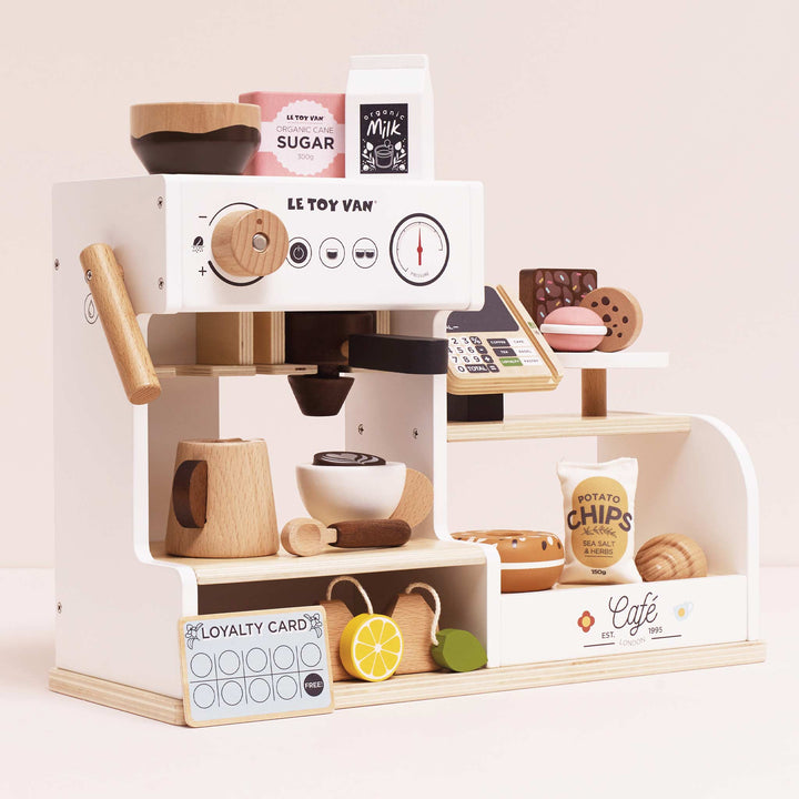 Enjoy cafŽ role play with Le Toy Van Barista CafŽ Shop wooden toys set featuring espresso machine and fun accessories