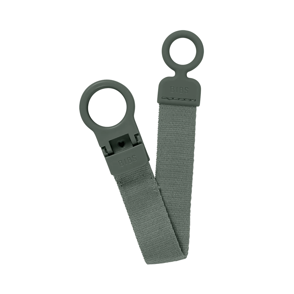 Side shot of BIBS Pacifier Clip Pine, practical clip for pacifiers.