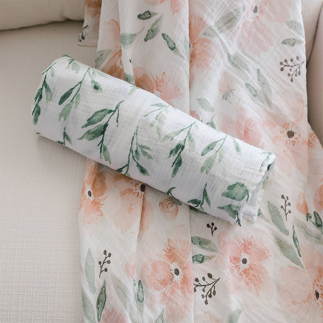 watercolor inspired pink floral and green vine crane baby cotton swaddle set 