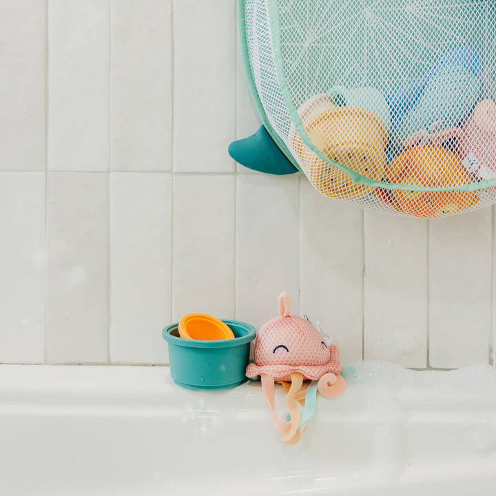 Copper Pearl bath organizer with toys inside, baby bath storage solution for easy cleanup and organization