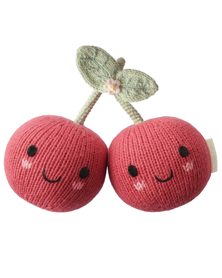 Cuddle + Kind Baby Cherries hand-knit plush toy, a soft 7-inch cotton fruit stuffed toy for babies