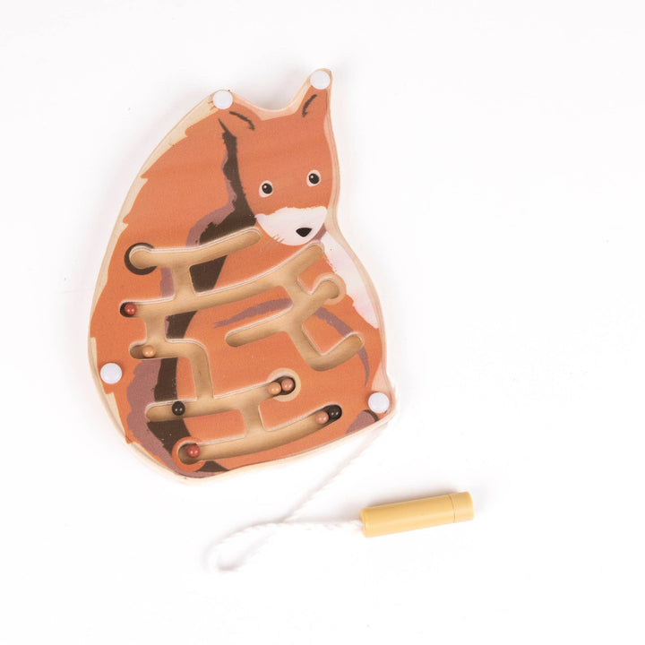 A fox shaped maze from Egmont's Mini Magnetic Color Maze lies beside its coiled string handle