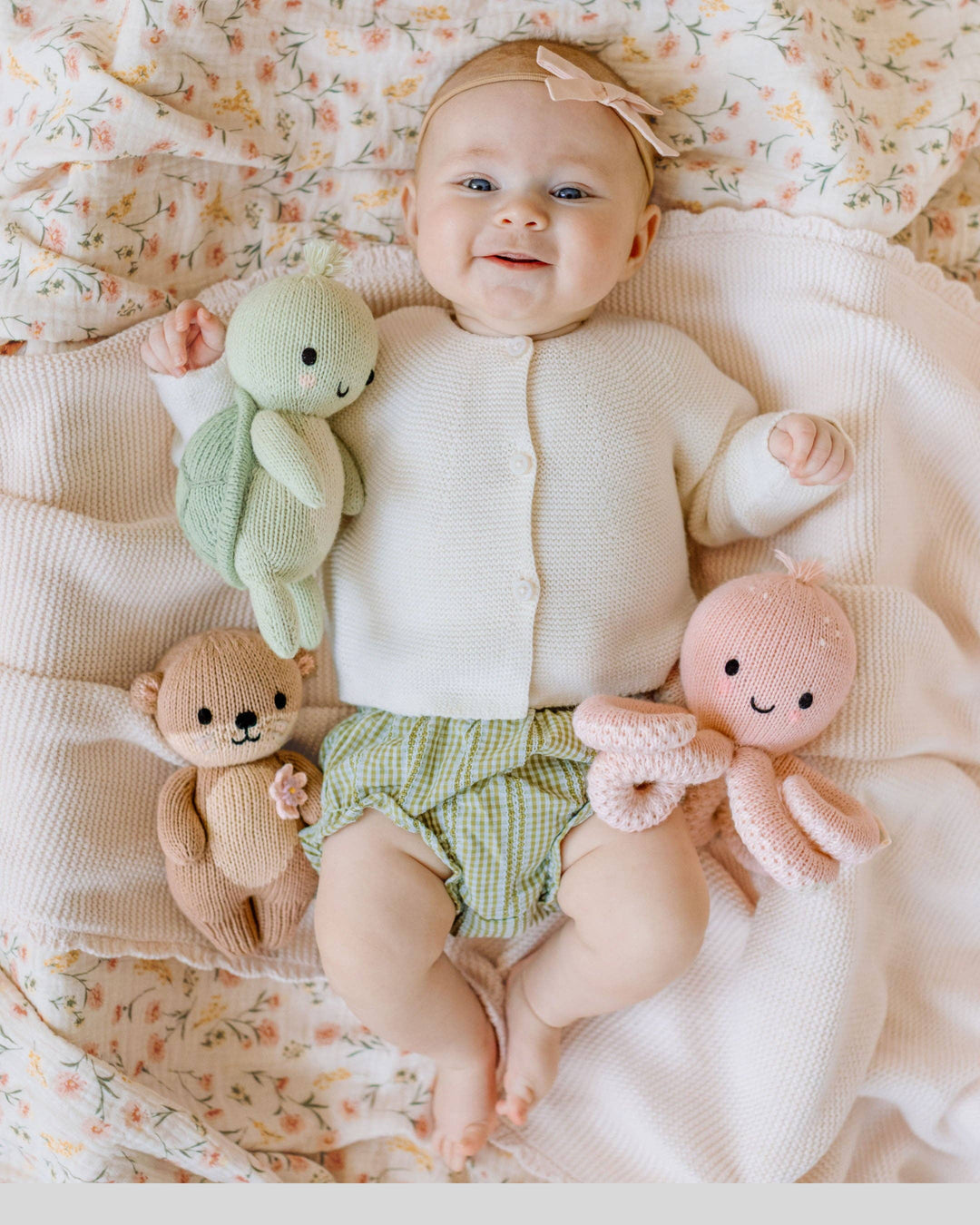 Soft cotton knit octopus stuffed animal Cuddle + Kind Baby Octopus in Soft Coral Pink, a sweet nursery keepsake