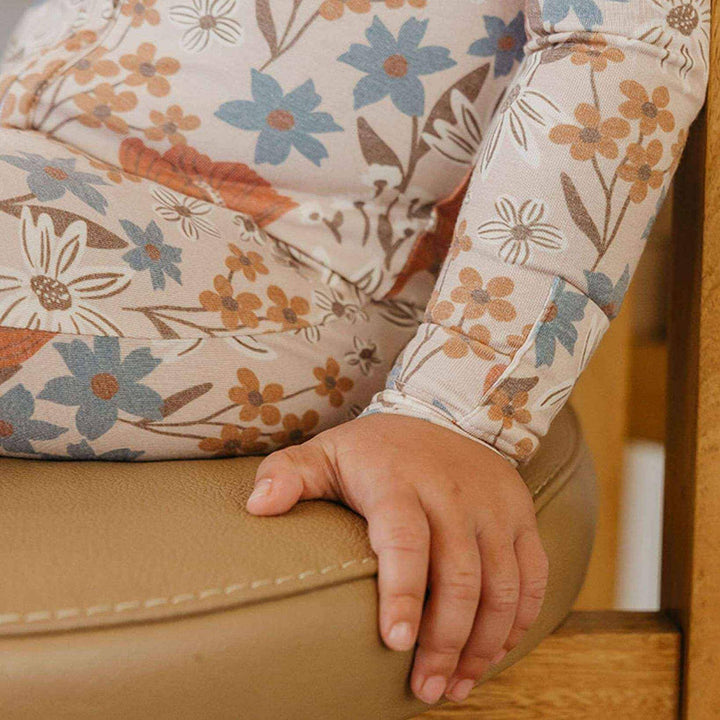 Close up of Copper Pearl Eden sleeve and cuff, soft infant sleepwear with stretch for everyday wear