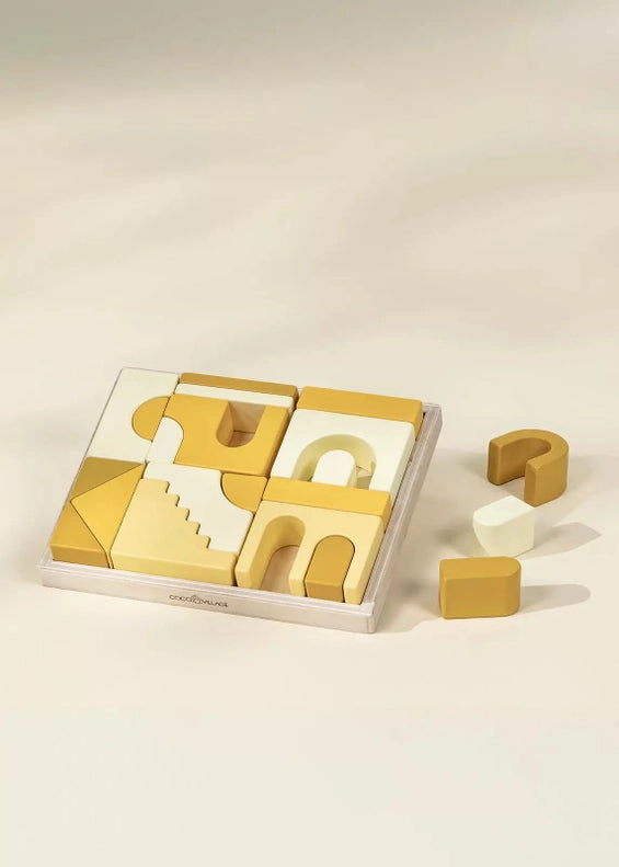 A playful scene featuring the Coco Village Houses Wooden Creative Blocks Set - 21Pcs, crafted as quality wood toys for creative play.