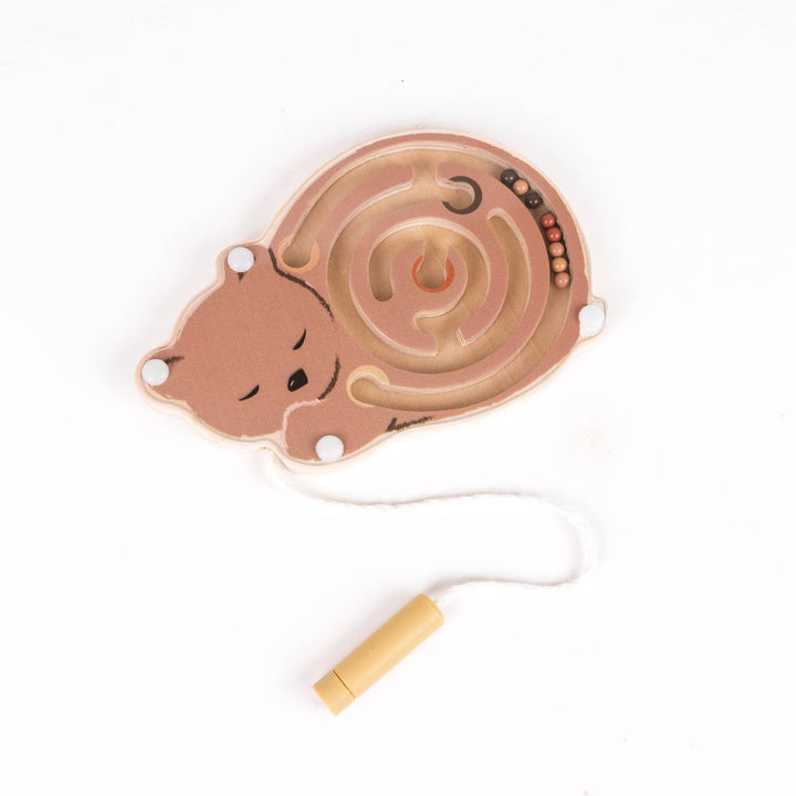 A tiny bear maze from Egmont's Mini Magnetic Color Maze reveals beads nestled in the spiral track