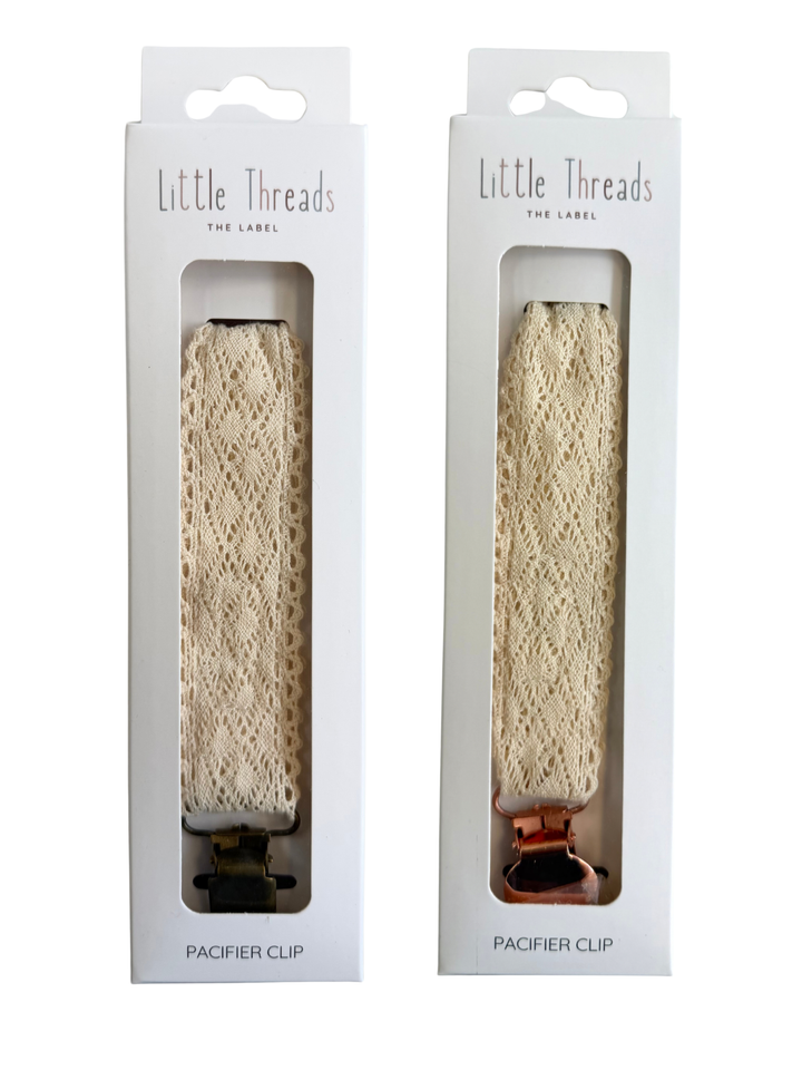 Two boxed Diamond Crochet Collection Pacifier Clips by Little Threads, a matching gift set idea for twins or siblings