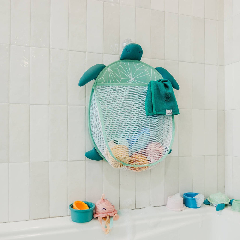 Copper Pearl bath toy organizer hanging in tub with toys, mesh storage for baby bath toys and bathroom organization