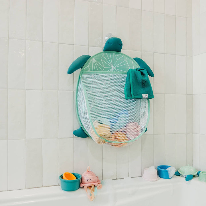 Copper Pearl bath toy organizer hanging in tub with toys, mesh storage for baby bath toys and bathroom organization