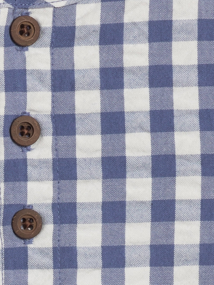Colored Organics Wren Seersucker Bubble Romper Features a snap closure bottom for easy diaper changes, crafted in a classic blue gingham pattern.