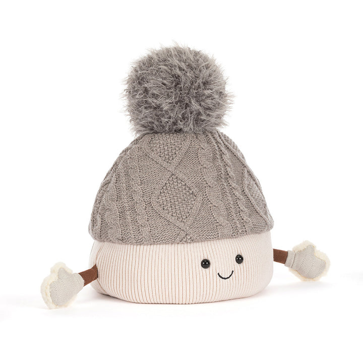 Angled view of Pomilly, Jellycat's cheerful pompom-hat Amuseables holiday collectible plush