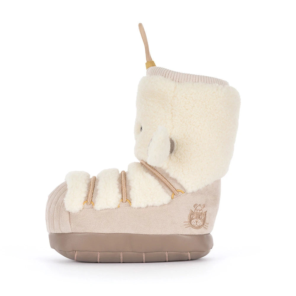 Side profile of Jellycat Amuseables Perta Snow Boot, a cozy winter collectible plush toy