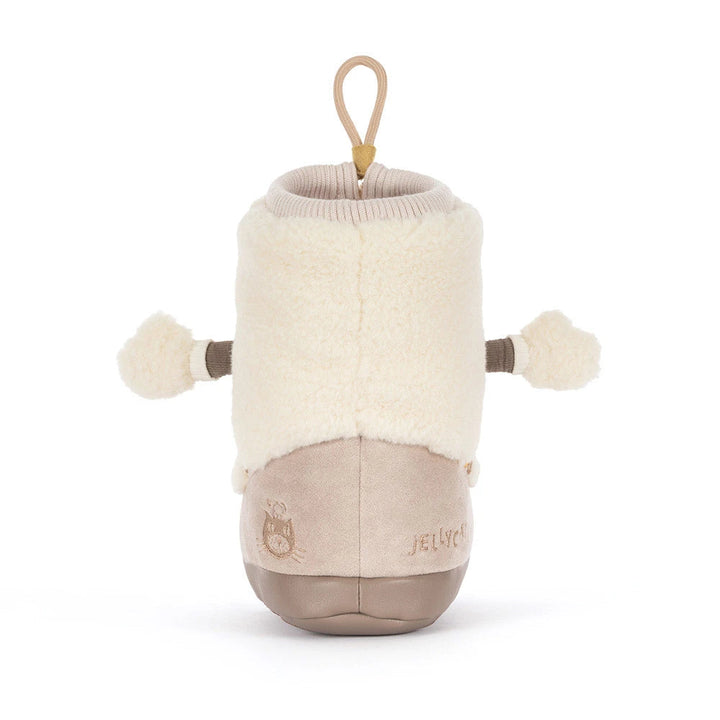 Rear view of Perta Snow Boot by Jellycat, highlighting the corduroy sole on this holiday plush