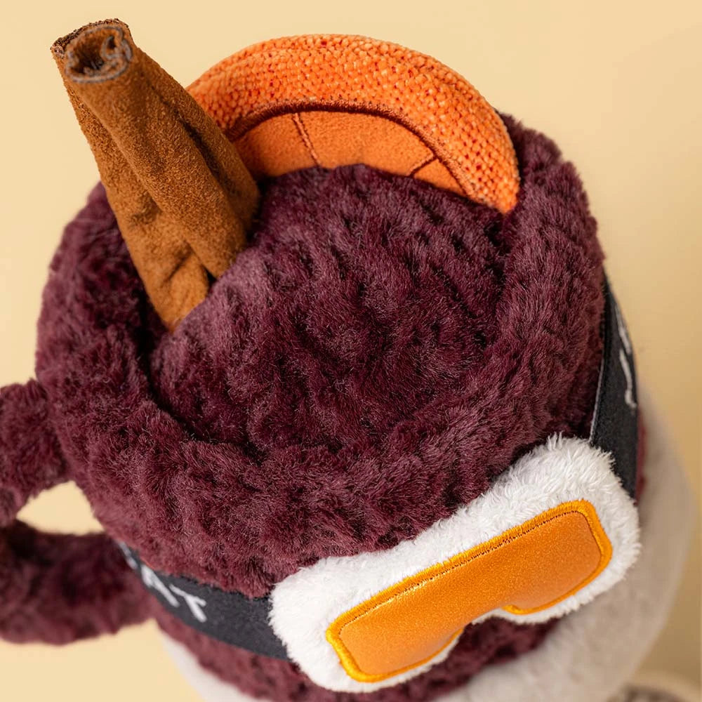 Close-up detail of Mullover Spiced Drink's face, a Jellycat Amuseables winter plush toy