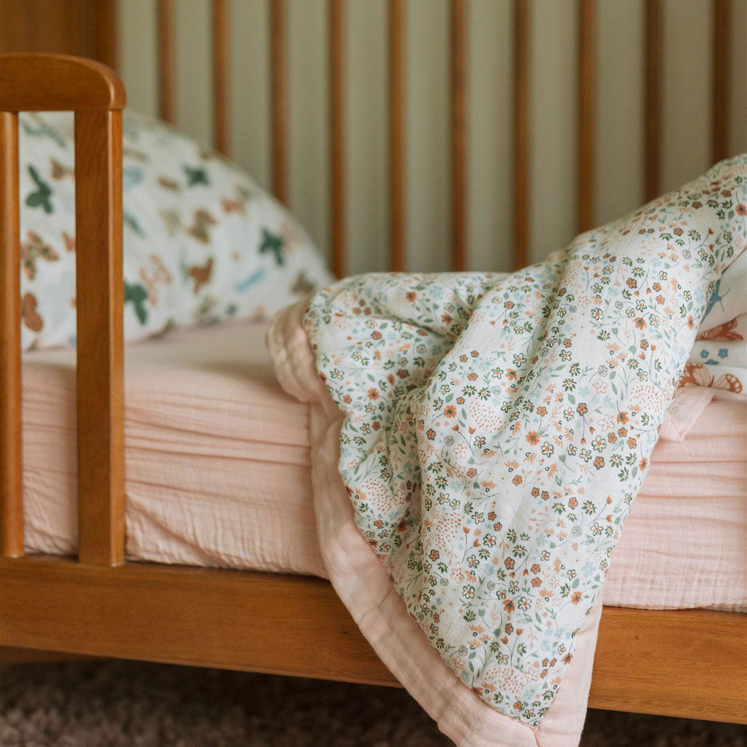 Little Unicorn Cotton Muslin Toddler Bedding 3 Piece Set - Butterflies, vibrant baby girl bedding with playful butterflies.