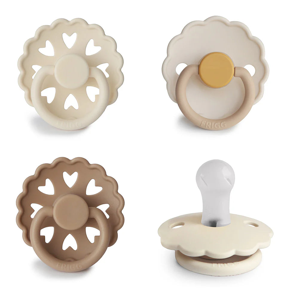 FRIGG Snowflake Dream silicone pacifier 4-pack size 1 side view - BPA-free orthodontic soother in cool winter tones