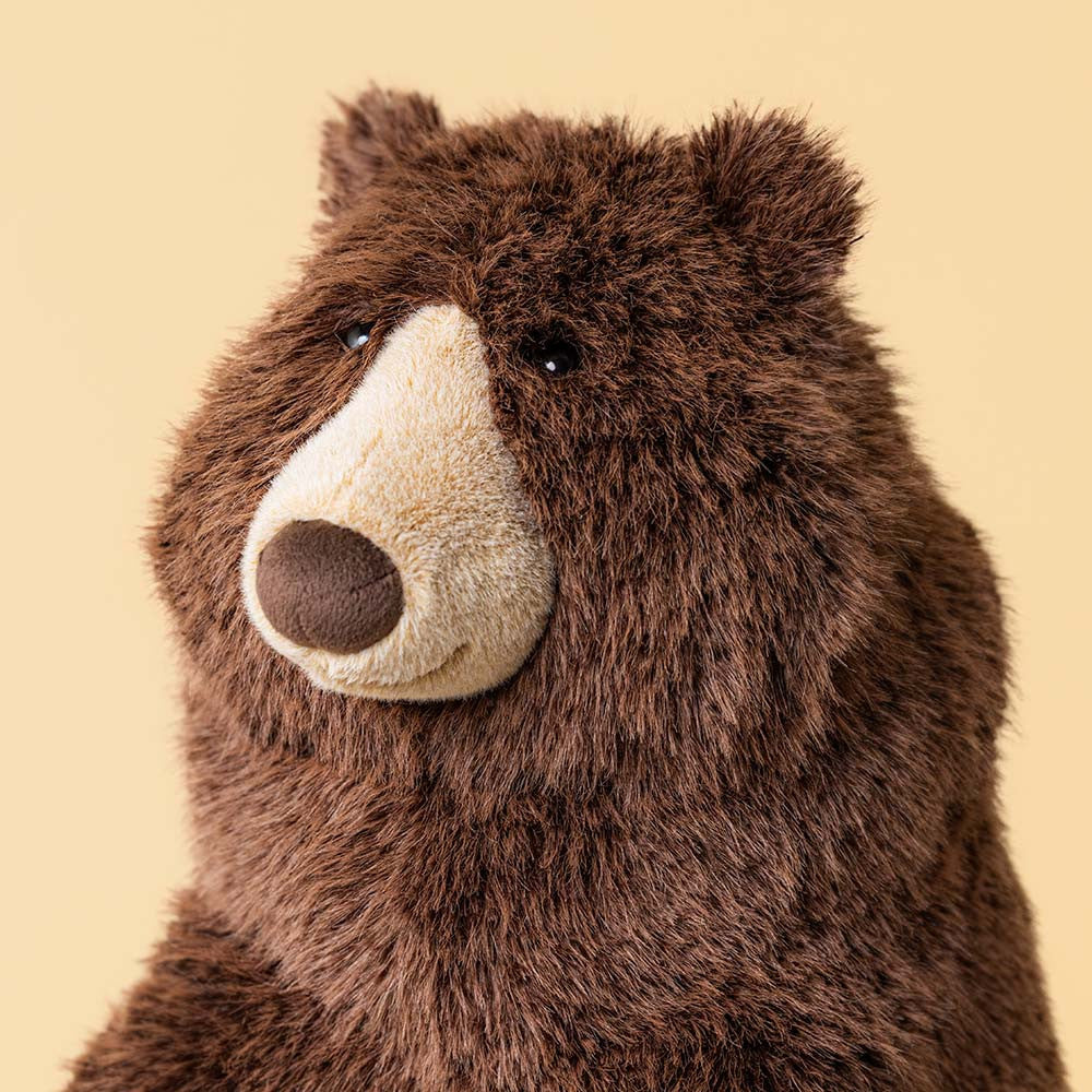 Jellycat Bizzlestomp Bear front view 15 inch sitting height scruffy brown bear plush collectible