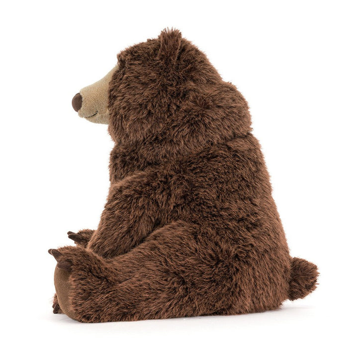 Jellycat Bizzlestomp Bear side profile view large weighted stuffed bear with textured coat and hard eye