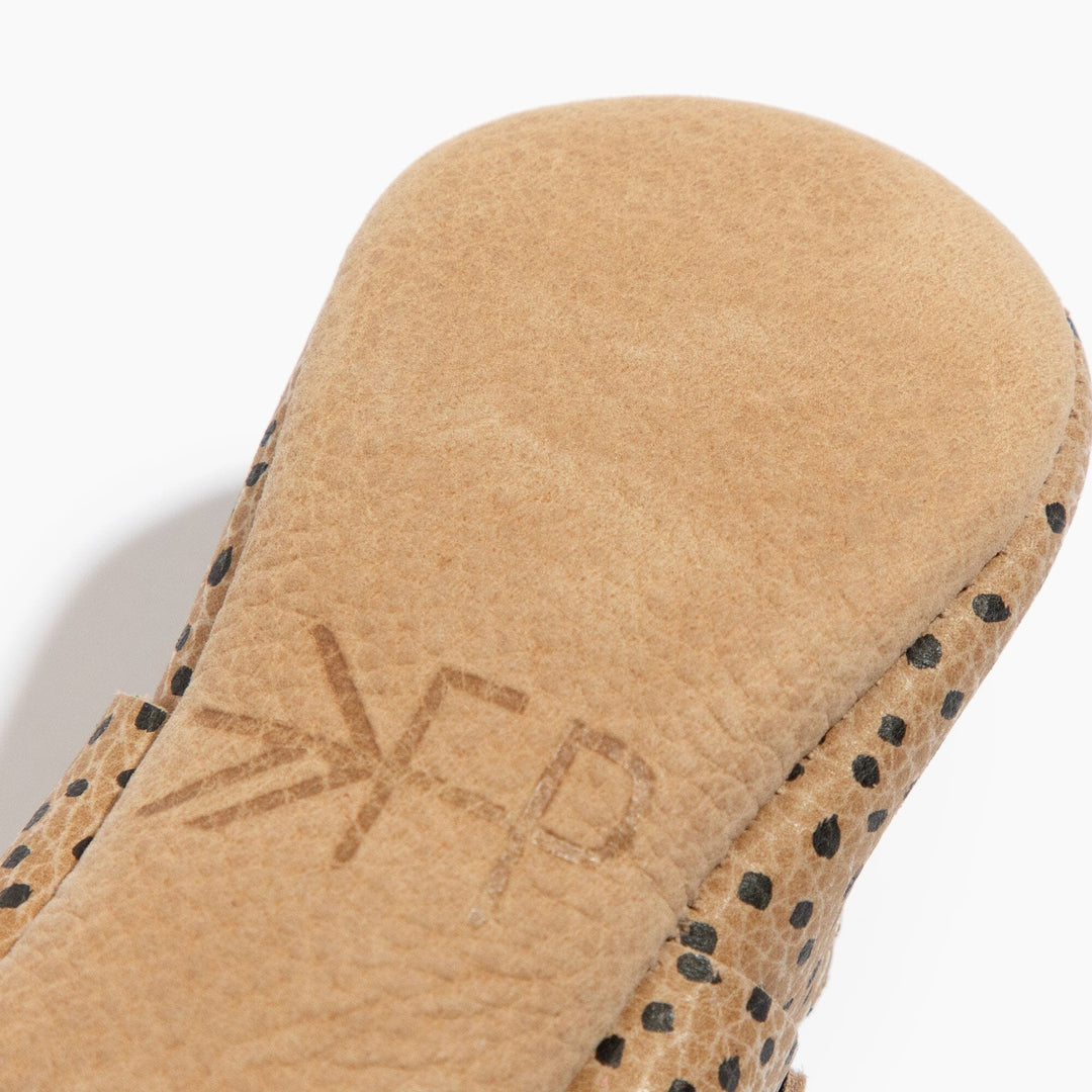 Freshly Picked Mary Jane baby shoe sole logo close-up, genuine leather